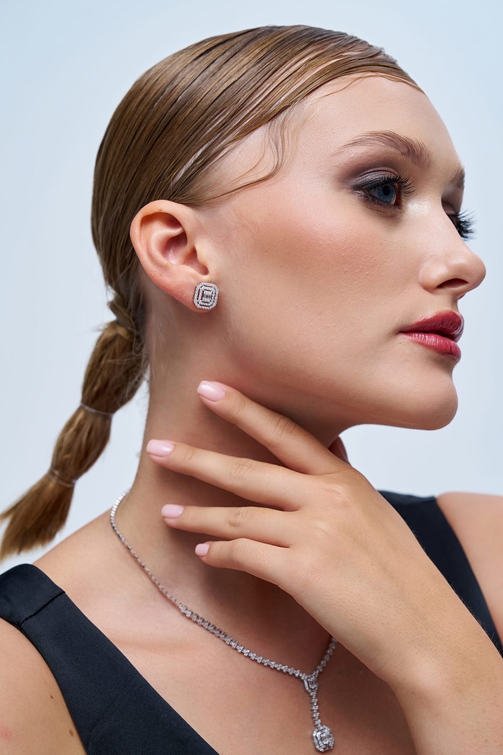 0.61 Karat  IDL Sertifikalı Tasarım Pırlanta Baget Küpe